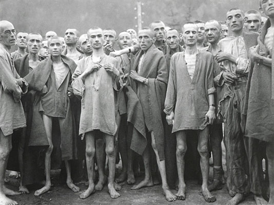 Inmates of Ebensee concentration camp after their liberation by American troops on May 6, 1945. Ebensee provided slave labor to build tunnels for armaments storage. Austria, World War 2. (BSLOC_2014_4_26)